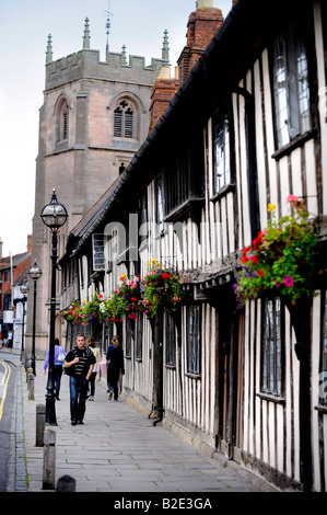 The fifteenth century timber-framed Church Street Almshouses, adjacent to the Guild Chapel in Stratford-upon-Avon. Stock Photo