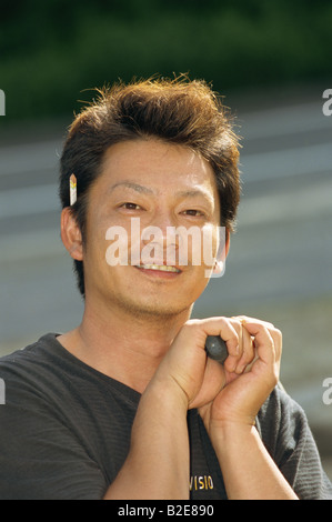 A young Japanese carpenter Stock Photo