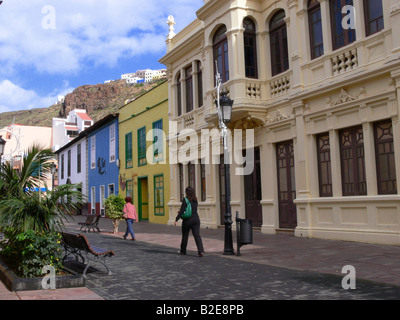 Two women walking in street, Calle Real, La Gomera, Canary Islands, Spain Stock Photo