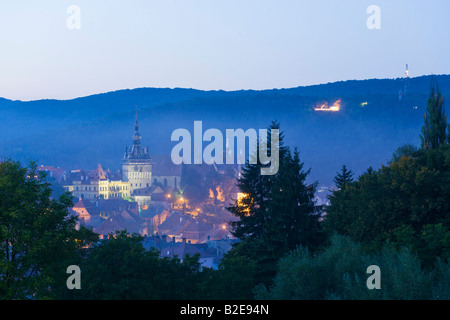 Fort lit up in city, Sighisoara Citadel, Mures County, Transylvania, Romania Stock Photo