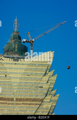 Crane on top of building Grand Lisboa Macau Guangdong Province China Stock Photo