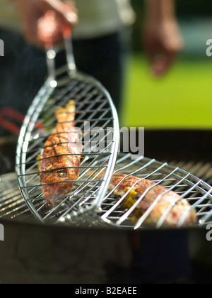 Close-up of fish on barbecue grill Stock Photo