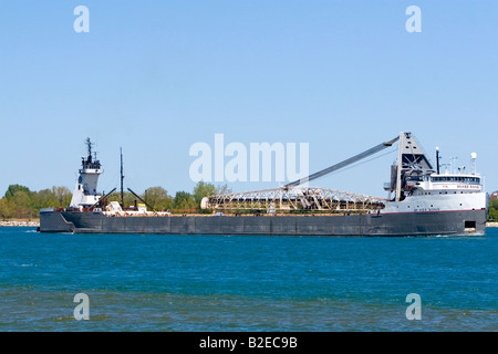 McKee Sons is a self unloading barge on the St Clair River at Port Huron Michigan Stock Photo