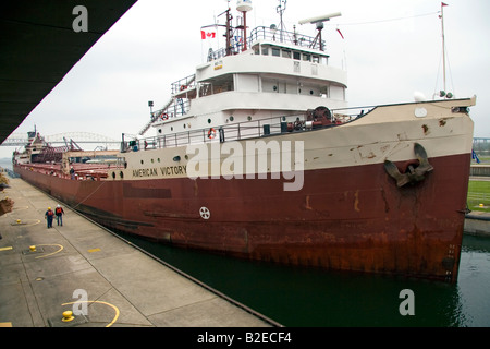 American Victory freighter in the Soo Locks at Sault Ste Marie Michigan Stock Photo