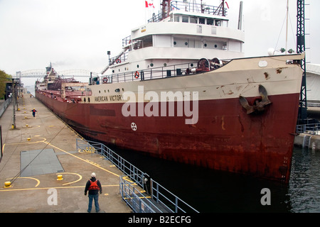 American Victory freighter in the Soo Locks at Sault Ste Marie Michigan Stock Photo