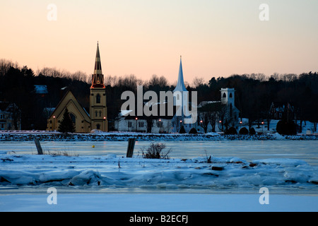 a mahone bay nova scotia winter scene with 3 churches Stock Photo