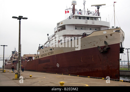 American Victory freighter in the Soo Locks at Sault Ste Marie Michigan Stock Photo