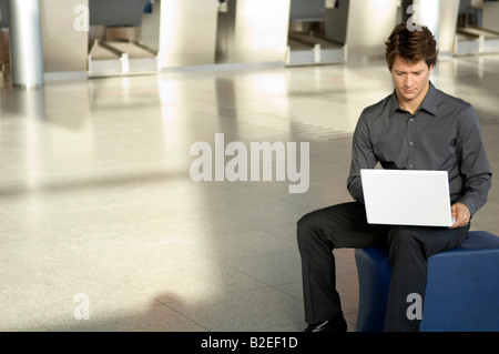 Businessman using a laptop Stock Photo