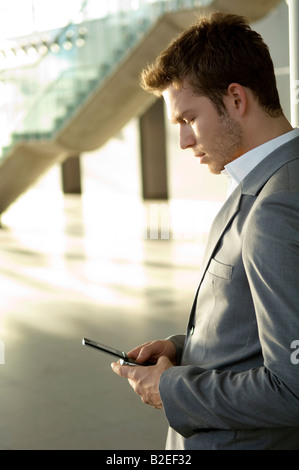 Businessman using a mobile phone Stock Photo