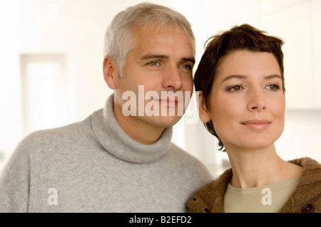 Close-up of a mature man and a mid adult woman looking away Stock Photo