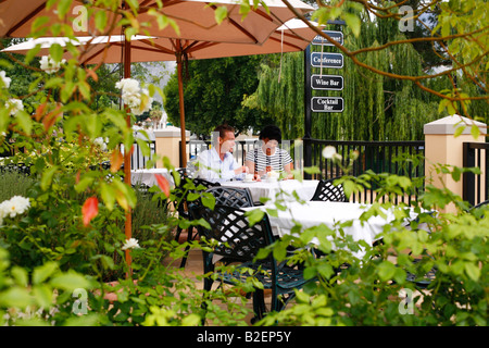 Couple having tea at outdoors restaurant in Franschoek Stock Photo