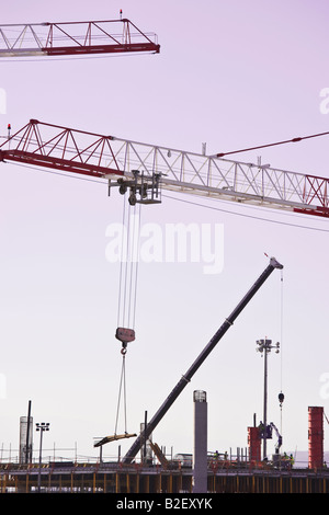 Cranes on construction site Stock Photo