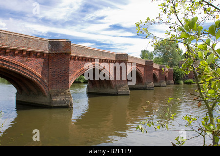 Decorative Red Brick Bridge over the Thames at Clifton Hampden Stock Photo