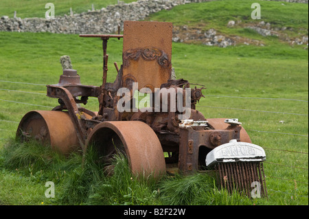 Barford roller, rusty abandoned machinery, on the pasture, side of the road, Fair Isle, Shetland Islands, Scotland, June