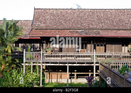 Traditional Malay house in Terengganu, Malaysia. The roof is made of baked clay tile. Stock Photo