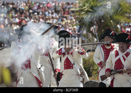 The Batallon de Canarias return fire during a reenactment of the 1797 battle of Santa Cruz, Tenerife Stock Photo