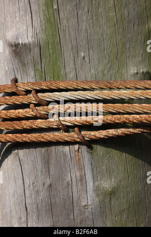 Rope fastened to bollard Stock Photo - Alamy