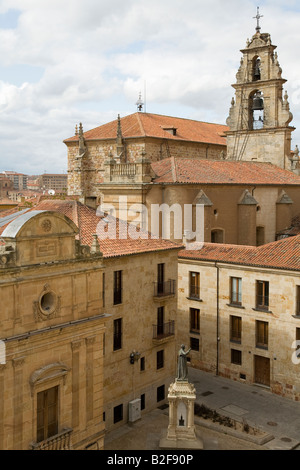 SPAIN Salamanca View of church bell tower plaza with statue and red tile roof of city buildings from platform at cathedral Stock Photo