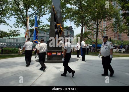 Korean War veterans and their families gather at the Universal Soldier Korean War Monument in Battery Park in New York Stock Photo