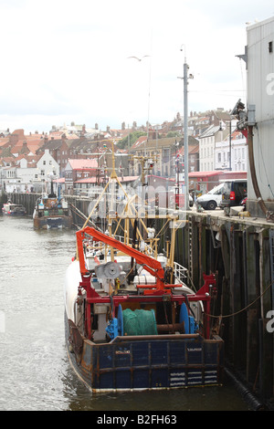 Fishing trawlers in Whitby Harbour, Whitby, North Yorkshire, England, U.K. Stock Photo