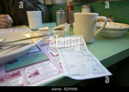 An inside view of an American Diner and the check for the breakfast meal Stock Photo