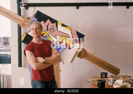 Roy Lichtenstein, American pop artist, standing in front of one of his works. Stock Photo