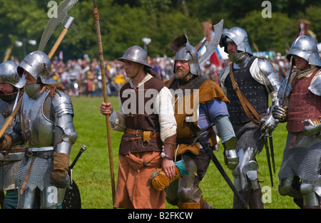 Knights in armour prepare for battle at Tewkesbury Medieval Festival Worcestershire UK EU Stock Photo