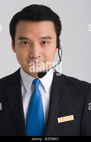 Portrait of a customer service representative wearing a headset Stock Photo