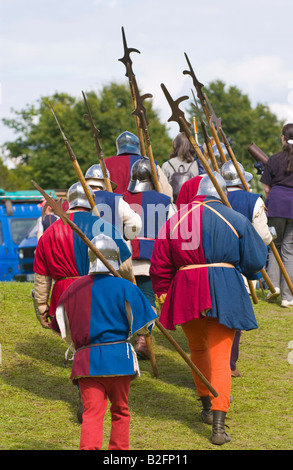 Soldiers in armour march from battle at Tewkesbury Medieval Festival Worcestershire UK EU Stock Photo