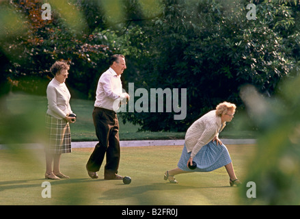 elderly people playing bowls, english country garden Stock Photo