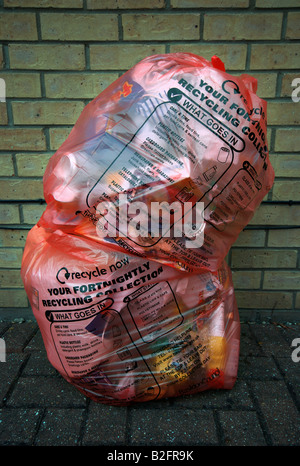 Recycling bags containing rubbish out for collection. Stock Photo