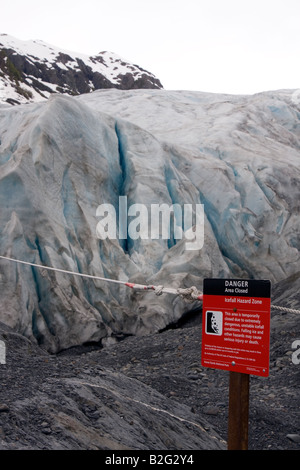 Keep out danger Sign in front of Exit Glacier, part of the harding Icefield, within Kenai Fjords National Park, Seward, Alaska Stock Photo
