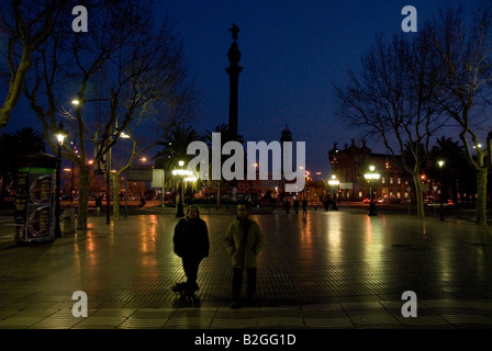 columbus statue view from las rambla by night or evening barcelona spain Stock Photo