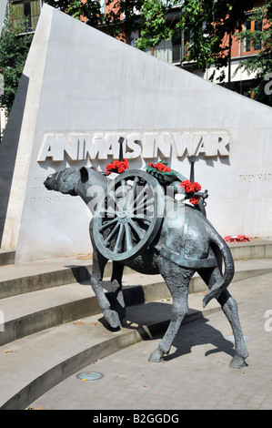 Animals in War memorial bronze mule & curved Portland stone wall sculpture by English sculptor David Backhouse Park Lane Hyde Park London England UK Stock Photo