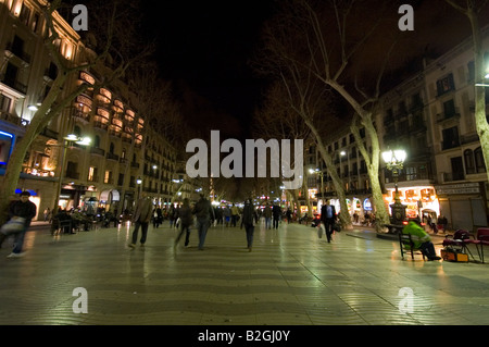 las ramblas at night people walk in Barcelona Spain Stock Photo