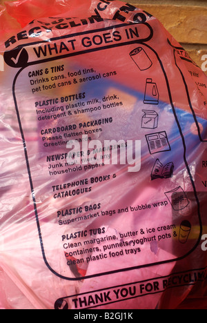 Recycling bags containing rubbish out for collection. Stock Photo