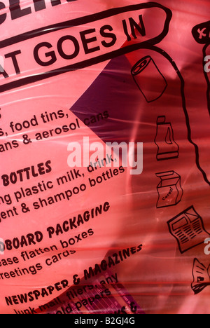 Recycling bags containing rubbish out for collection. Stock Photo