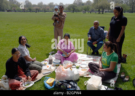 Extended family picnic in park Stock Photo