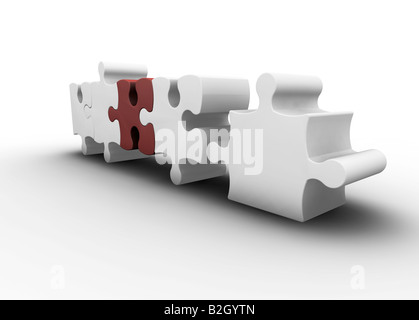 3D render of one red puzzle piece amongst white ones Stock Photo