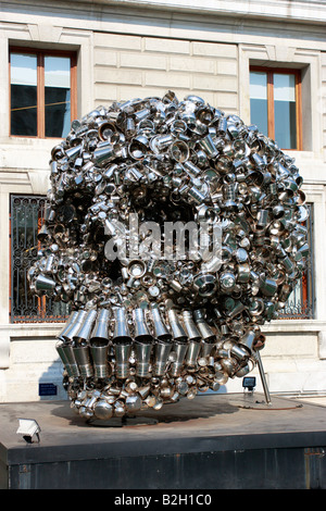 modern art sculpture entitled  VERY HUNGRY GOD on display beside the Grand Canal in Venice,Italy Stock Photo