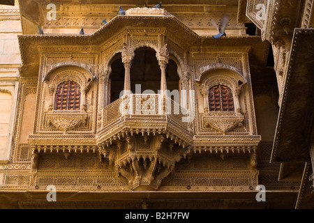 Window of the Patwa Ki Haveli is the finest example of sandstone construction in the GOLDEN CITY of JAISALMER RAJASTHAN INDIA Stock Photo