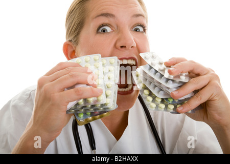 spinned crazy excessive amount overdose tablets pills addiction to pills drug industry pharmaceutical pharmaceutics medicine Stock Photo