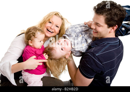 mother father parents dad mum sons sib siblings familly portrait consonance harmoniousness harmony Stock Photo