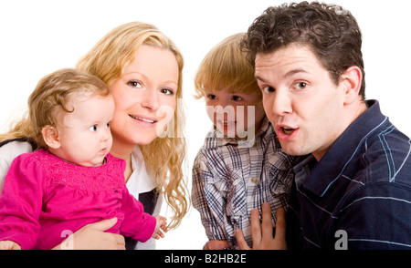 mother father parents dad mum sons sib siblings familly portrait consonance harmoniousness harmony Stock Photo