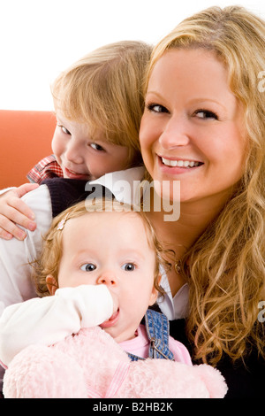 mother sons sib siblings familly portrait consonance harmoniousness harmony Stock Photo