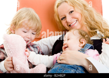 mother sons sib siblings familly portrait consonance harmoniousness harmony Stock Photo