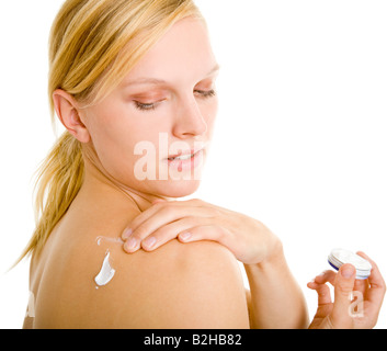 put on some lotion skin care cosmetic beauty care skincare wellness body lotion Stock Photo