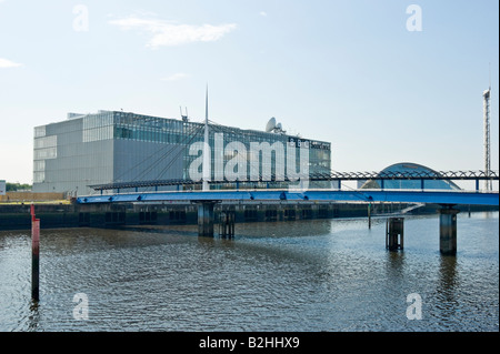 The new BBC Scotland headquarters building at Pacific Quay on the River Clyde in Govan Glasgow Scotland & Bells Bridge Stock Photo