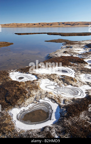 Ice Patterns Logan Burn Reservoir Great Moss Swamp and Lammermoor Range Old Dunstan Trail Central Otago South Island New Zealand Stock Photo