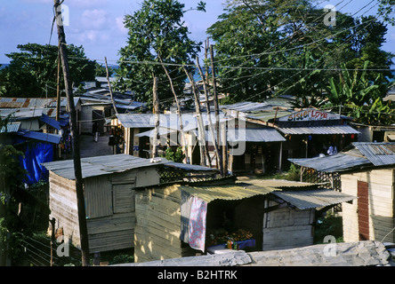 geography / travel, Jamaica, Negril, western Jamaica, suburbian huts near Hotels, wood huts, corrugated sheet metal, Stock Photo